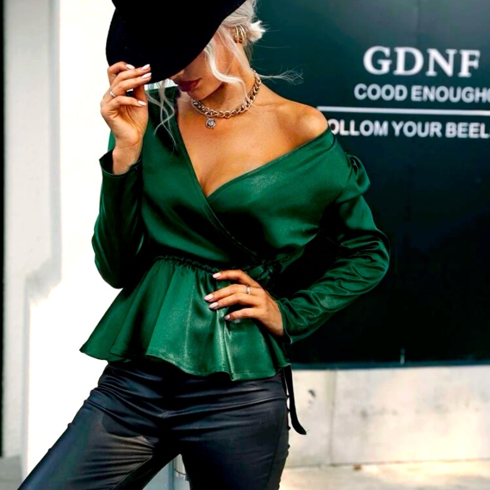 This is a SHEIN holiday green top in Size M, it really fits more like a Large.